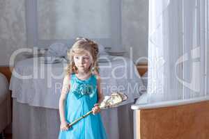 Confused blue-eyed girl posing in elegant dress