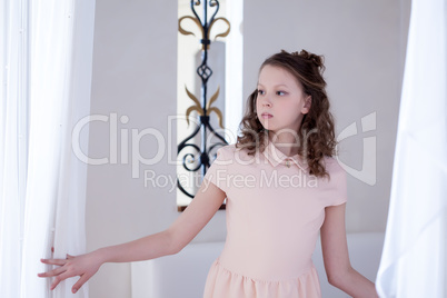 Image of serious elegant girl posing at camera