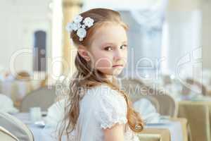 Cute little girl posing with hair decoration