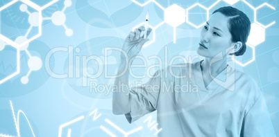 Composite image of serious doctor holding an injection in hospit