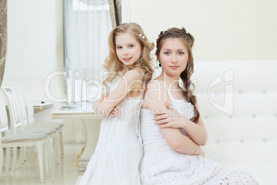 Lovely young models posing in restaurant