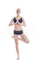 Comely young woman posing meditating at camera