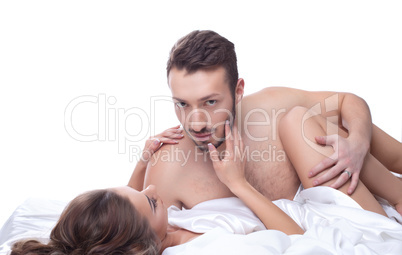 Hot man posing at camera while caressing his lover