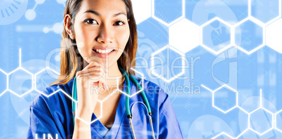 Composite image of asian nurse thinking with hand on chin