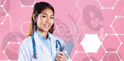 Composite image of asian doctor holding clipboard