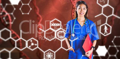 Composite image of asian nurse with stethoscope looking at the c