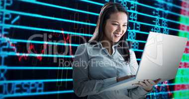 Composite image of smiling businesswoman using laptop