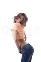 Slender woman coquettishly curving in studio