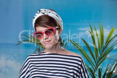 Pretty middle-aged woman dressed in sailor's style