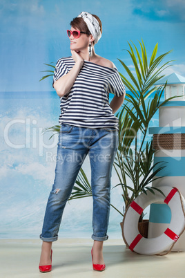 Merry middle-aged model posing in sailor's style