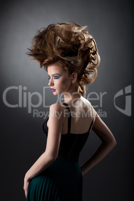 Image of model with volume hair and disco makeup