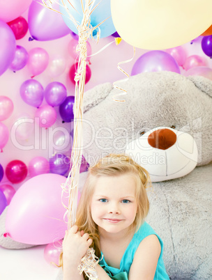 Nice blue-eyed girl posing looking at camera