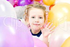 Cheerful girl posing with balloons, close-up