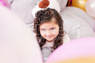 Portrait of lovely little brown-eyed girl