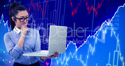 Composite image of asian woman using laptop