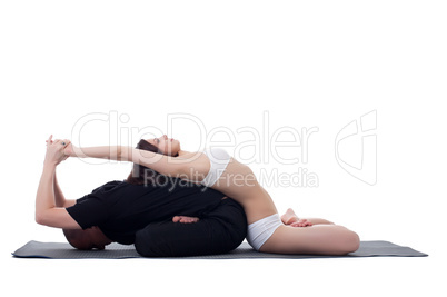 Healthy couple doing yoga and meditating