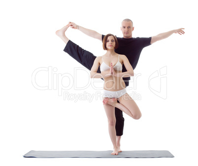 Attractive Europeans practicing yoga at camera