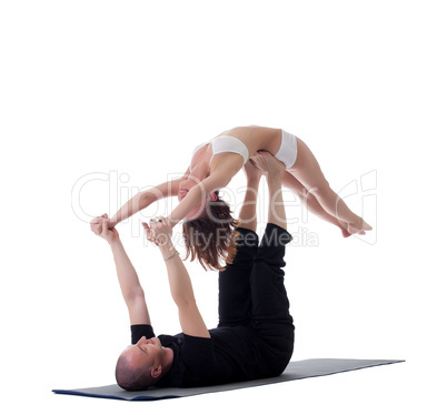 Couple of flexible yogis, isolated on white