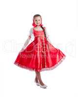 Cute little girl posing in Russian sundress