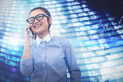 Composite image of smiling asian businesswoman on phone call