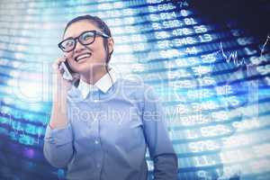 Composite image of smiling asian businesswoman on phone call