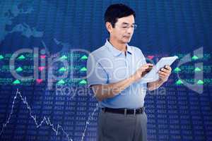 Composite image of man using digital tablet while standing