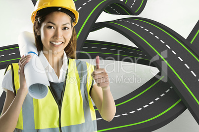 Composite image of architect woman with thumbs up