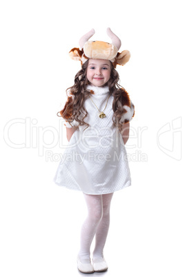 Adorable little girl posing in cow costume