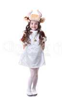 Adorable little girl posing in cow costume