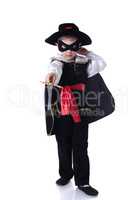 Serious little boy posing in Zorro costume