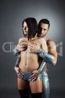 Passionate man holding his girlfriend's breast
