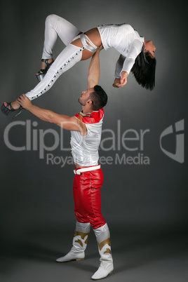 Artistic striptease dancers posing in studio