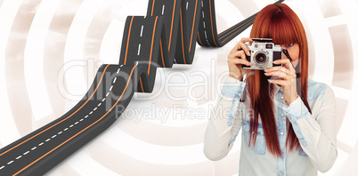 Composite image of attractive hipster photographing with camera Composite image of attractive hipster photographing with camera