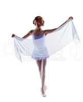 Adorable little ballerina dancing with cloth
