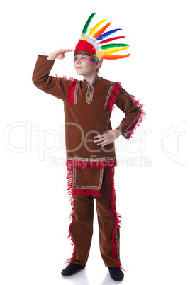 Serious young boy posing in Indian costume