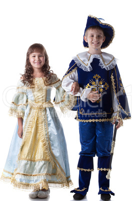 Image of happy kids posing in carnival costumes