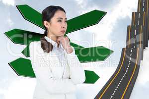 Composite image of asian businesswoman touching her chin