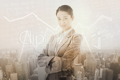 Composite image of portrait of a beautiful businesswoman posing