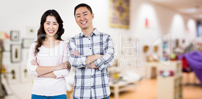 Composite image of full length portrait of happy couple