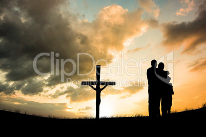 Composite image of happy family embracing each other over