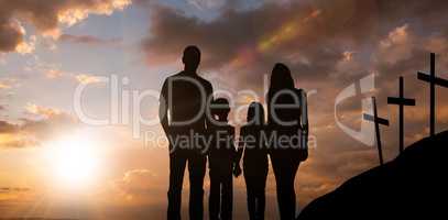 Composite image of cheerful family holding hands