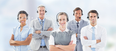 Composite image of portrait of business people standing with arm