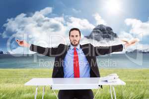 Composite image of unsmiling businessman sitting with arms outst