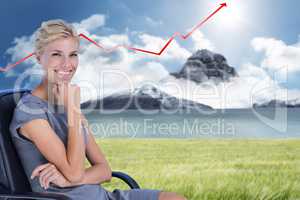 Composite image of portrait of smiling businesswoman sitting on