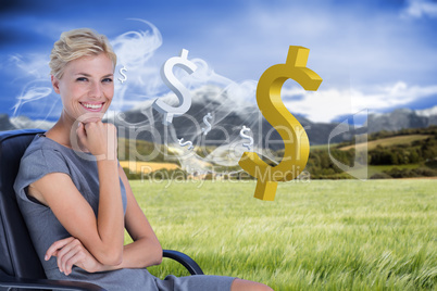 Composite image of portrait of smiling businesswoman sitting on