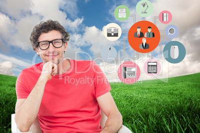 Composite image of happy businessman wearing reading glasses whi