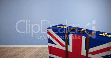 Composite image of great britain flag suitcase