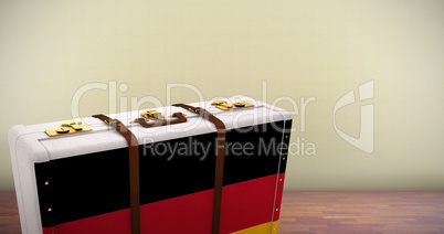 Composite image of german flag suitcase