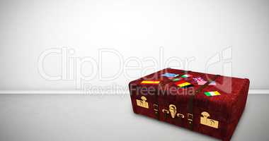 Composite image of suitcase with stickers