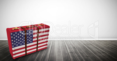 Composite image of usa flag suitcase